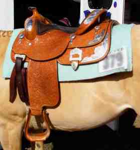 A heavy, Western show saddle.
